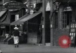 Standbild Harlem street scene in 1939 New York City USA, 1939, aus Sekunde 57 historischem Filmmaterial Videoclip 65675074863