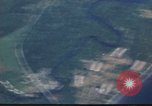 Image of strafing Japanese warehouses Pacific Theater, 1944, second 3 stock footage video 65675074901