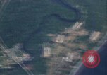 Image of strafing Japanese warehouses Pacific Theater, 1944, second 5 stock footage video 65675074901