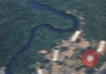 Image of strafing Japanese warehouses Pacific Theater, 1944, second 8 stock footage video 65675074901
