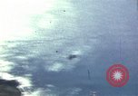 Image of strafing Japanese warehouses Pacific Theater, 1944, second 13 stock footage video 65675074901
