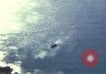 Image of strafing Japanese warehouses Pacific Theater, 1944, second 14 stock footage video 65675074901
