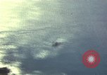 Image of strafing Japanese warehouses Pacific Theater, 1944, second 15 stock footage video 65675074901