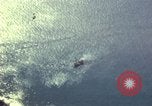 Image of strafing Japanese warehouses Pacific Theater, 1944, second 16 stock footage video 65675074901