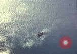 Image of strafing Japanese warehouses Pacific Theater, 1944, second 17 stock footage video 65675074901