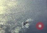 Image of strafing Japanese warehouses Pacific Theater, 1944, second 19 stock footage video 65675074901