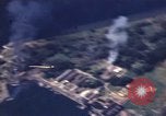 Image of strafing Japanese warehouses Pacific Theater, 1944, second 24 stock footage video 65675074901