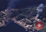 Image of strafing Japanese warehouses Pacific Theater, 1944, second 25 stock footage video 65675074901