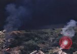Image of strafing Japanese warehouses Pacific Theater, 1944, second 27 stock footage video 65675074901