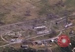 Image of strafing Japanese warehouses Pacific Theater, 1944, second 32 stock footage video 65675074901