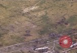 Image of strafing Japanese warehouses Pacific Theater, 1944, second 33 stock footage video 65675074901