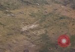 Image of strafing Japanese warehouses Pacific Theater, 1944, second 34 stock footage video 65675074901