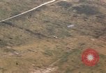 Image of strafing Japanese warehouses Pacific Theater, 1944, second 35 stock footage video 65675074901