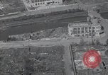 Immagine di Danni di bomba Kobe Giappone, 1945, secondo 48 filmato di repertorio 65675074918