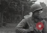 Standbild USA Infanteristen Marigny Frankreich, 1944, aus Sekunde 59 historischem Filmmaterial Videoclip 65675075090