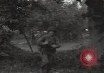 Standbild USA Infanteristen Marigny Frankreich, 1944, aus Sekunde 17 historischem Filmmaterial Videoclip 65675075091