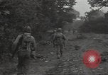 Standbild USA Infanteristen Marigny Frankreich, 1944, aus Sekunde 59 historischem Filmmaterial Videoclip 65675075091