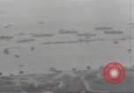Image of Allied ships with reinforcements and supplies Normandy France, 1944, second 21 stock footage video 65675075096