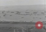 Image of Allied ships with reinforcements and supplies Normandy France, 1944, second 37 stock footage video 65675075096