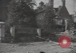 Image of bombed-out buildings Caen France, 1944, second 9 stock footage video 65675075099