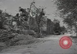 Image of bombed-out buildings Caen France, 1944, second 16 stock footage video 65675075099