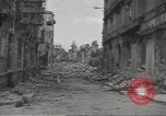 Image of bombed-out buildings Caen France, 1944, second 58 stock footage video 65675075099