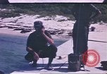 Standbild USA Soldaten Saipan Marianen, 1945, aus Sekunde 20 historischem Filmmaterial Videoclip 65675075189