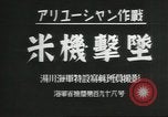 Standbild japanische Kriegsschiffe Brand bei uns Flugzeuge über Insel Kiska Aleutians, 1942, aus Sekunde 10 historischem Filmmaterial Videoclip 65675075195