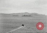 Standbild japanische Kriegsschiffe Brand bei uns Flugzeuge über Insel Kiska Aleutians, 1942, aus Sekunde 13 historischem Filmmaterial Videoclip 65675075195