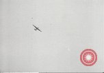 Standbild japanische Kriegsschiffe Brand bei uns Flugzeuge über Insel Kiska Aleutians, 1942, aus Sekunde 21 historischem Filmmaterial Videoclip 65675075195