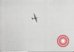 Standbild japanische Kriegsschiffe Brand bei uns Flugzeuge über Insel Kiska Aleutians, 1942, aus Sekunde 26 historischem Filmmaterial Videoclip 65675075195