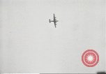 Standbild japanische Kriegsschiffe Brand bei uns Flugzeuge über Insel Kiska Aleutians, 1942, aus Sekunde 27 historischem Filmmaterial Videoclip 65675075195
