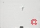 Standbild japanische Kriegsschiffe Brand bei uns Flugzeuge über Insel Kiska Aleutians, 1942, aus Sekunde 28 historischem Filmmaterial Videoclip 65675075195