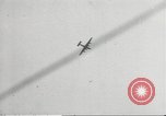 Standbild japanische Kriegsschiffe Brand bei uns Flugzeuge über Insel Kiska Aleutians, 1942, aus Sekunde 31 historischem Filmmaterial Videoclip 65675075195