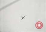 Standbild japanische Kriegsschiffe Brand bei uns Flugzeuge über Insel Kiska Aleutians, 1942, aus Sekunde 32 historischem Filmmaterial Videoclip 65675075195