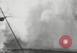 Standbild japanische Kriegsschiffe Brand bei uns Flugzeuge über Insel Kiska Aleutians, 1942, aus Sekunde 33 historischem Filmmaterial Videoclip 65675075195