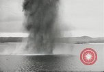 Standbild japanische Kriegsschiffe Brand bei uns Flugzeuge über Insel Kiska Aleutians, 1942, aus Sekunde 37 historischem Filmmaterial Videoclip 65675075195