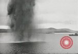 Standbild japanische Kriegsschiffe Brand bei uns Flugzeuge über Insel Kiska Aleutians, 1942, aus Sekunde 38 historischem Filmmaterial Videoclip 65675075195