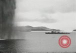 Standbild japanische Kriegsschiffe Brand bei uns Flugzeuge über Insel Kiska Aleutians, 1942, aus Sekunde 39 historischem Filmmaterial Videoclip 65675075195