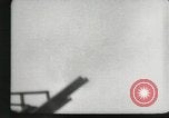 Standbild japanische Kriegsschiffe Brand bei uns Flugzeuge über Insel Kiska Aleutians, 1942, aus Sekunde 43 historischem Filmmaterial Videoclip 65675075195