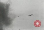 Standbild japanische Kriegsschiffe Brand bei uns Flugzeuge über Insel Kiska Aleutians, 1942, aus Sekunde 46 historischem Filmmaterial Videoclip 65675075195
