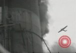 Standbild japanische Kriegsschiffe Brand bei uns Flugzeuge über Insel Kiska Aleutians, 1942, aus Sekunde 49 historischem Filmmaterial Videoclip 65675075195
