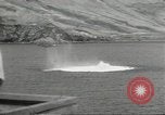 Standbild japanische Kriegsschiffe Brand bei uns Flugzeuge über Insel Kiska Aleutians, 1942, aus Sekunde 52 historischem Filmmaterial Videoclip 65675075195