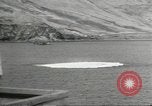 Standbild japanische Kriegsschiffe Brand bei uns Flugzeuge über Insel Kiska Aleutians, 1942, aus Sekunde 55 historischem Filmmaterial Videoclip 65675075195
