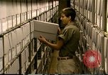 Standbild Storage Shelves Washington DC USA, 1990, aus Sekunde 61 historischem Filmmaterial Videoclip 65675075217