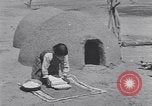 Image of Pueblo Native American Indian food preparation United States USA, 1920, second 30 stock footage video 65675075281