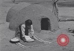 Image of Pueblo Native American Indian food preparation United States USA, 1920, second 31 stock footage video 65675075281