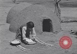 Image of Pueblo Native American Indian food preparation United States USA, 1920, second 33 stock footage video 65675075281