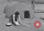 Image of Pueblo Native American Indian food preparation United States USA, 1920, second 35 stock footage video 65675075281