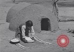 Image of Pueblo Native American Indian food preparation United States USA, 1920, second 38 stock footage video 65675075281